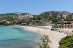 The Beach At Baja Sardinia Stock Photo