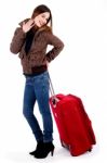 Young Lady Posing With Luggage Stock Photo