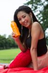 Woman With Orange Juice Stock Photo