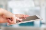 Woman Hand Hold White Tablet With Blank Empty  Screen Stock Photo