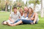 Family Posing For Camera Stock Photo