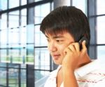 Office Worker Talking On The Phone Stock Photo