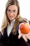 Young Woman Showing Apple Stock Photo