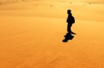 Early Morning Climbers On Sand Dune Near Sossusvlei, Namibia Stock Photo