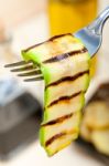 Grilled Zucchini Courgette On A Fork Stock Photo