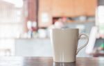 Coffee Mug In Coffee Shop Stock Photo