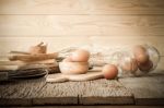 Egg, Chicken Egg In Wood Bowl On Old Wooden Table Stock Photo