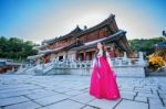 Woman With Hanbok In Gyeongbokgung,the Traditional Korean Dress Stock Photo