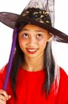 Young Witch With Stick Stock Photo