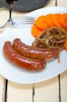 Beef Sausages Cooked On Iron Skillet Stock Photo