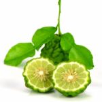 Fresh Fruits And Green Leaves Of Kiffir Lime Or Leech Lime On Wh Stock Photo