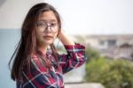 Portrait Of Thai Teen Glasses Beautiful Girl Relax And Smile Stock Photo