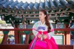 Woman With Hanbok In Gyeongbokgung,the Traditional Korean Dress Stock Photo