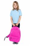 Little Schoolgirl Posing With Pink Backpack Stock Photo