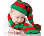 Baby With Christmas Hat And Scarf Stock Photo