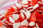 Red White Heart Shape Jelly Candy Bonbon Snack Group. Sweet For Valentines Day Background Stock Photo