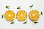 Slices Of Pineapple Isolated On White Stock Photo