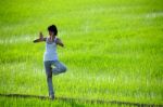 Girl Practicing Yoga Stock Photo