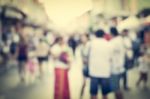 Blurred People Walking On The Street Of Old Town Stock Photo