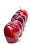 Fresh And Healthy Red Apples In A Row Stock Photo