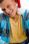 Young Male Wearing Christmas Hat Stock Photo