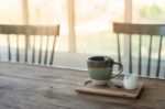 Ceramic Coffee Cup On Wood Table Stock Photo