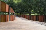 Wooden Walkway In The Park Stock Photo