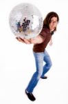 Side Pose Of Male Showing Disco Ball Stock Photo