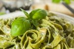 Homemade Spinach Pasta With Pesto And Parmesan Cheese Stock Photo