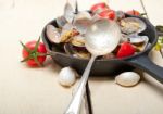 Fresh Clams On An Iron Skillet Stock Photo