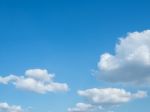 Blue Sky Background With Tiny Clouds Stock Photo