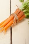 Baby Carrots Bunch Tied With Rope Stock Photo