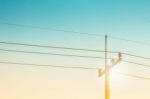 Electricity Pylon And Blue Sky Stock Photo