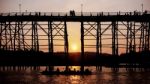 Silhouetted Bridge At Sunset Stock Photo