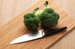 Broccoli On Wooden Board Stock Photo