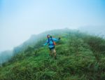 Happy People  With Arms Raised Up And  Enjoying  Beautiful Tropical Rainforest At And Beautiful Mountain Background  With  Nature Landscape Stock Photo