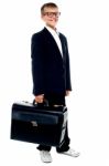 Young Kid Holding Briefcase Stock Photo