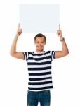 Young Male Holding Blank Board Stock Photo