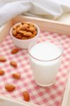 Almond Milk In Glass Stock Photo