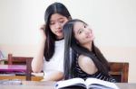 Two Asia Thai High School Student Uniform Best Friends Beautiful Girl Reading Book Stock Photo