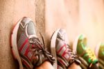 Foot Wear Shoes On The Wall Stock Photo