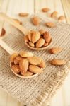 Almond In Wooden Spoon Stock Photo