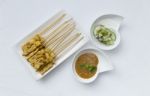 Pork Satay With Cucumber Salsa And Peanut Sauce Stock Photo