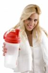 Smiling Woman Holding Sipper Bottle Stock Photo