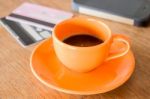 Hot Coffee Cup On Wooden Table Stock Photo