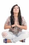 Younger Woman Praying Stock Photo