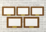 Blank Wooden Frames On Wall Stock Photo