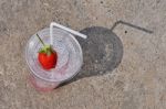 White Drinking Straw And Strawberry Stock Photo