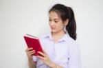 Asia Thai High School Student Uniform Beautiful Girl Read A Book Stock Photo