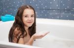 Little Girl Taking A Bath Stock Photo